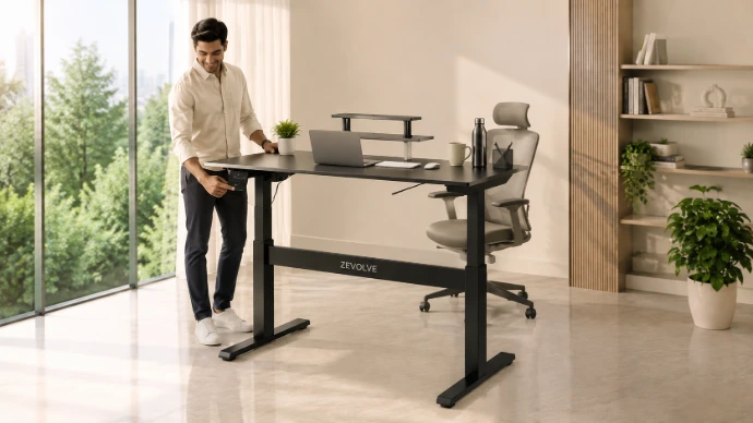 A person using the height adjustable desk